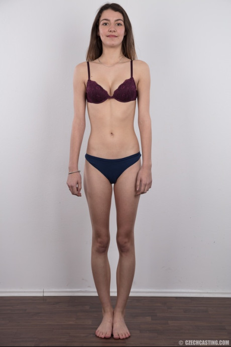 Great looking young Pandora strips her clothes off and smiles at the casting