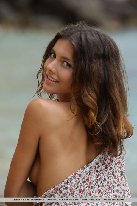 Hot bitch Divina A flashes no panty upskirt & bares her hot booty at the beach
