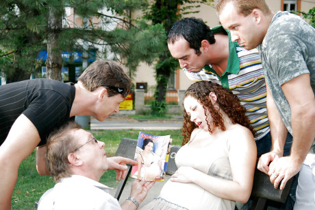 Curly-haired pregnant bitch gets boned by four horny lads outdoor