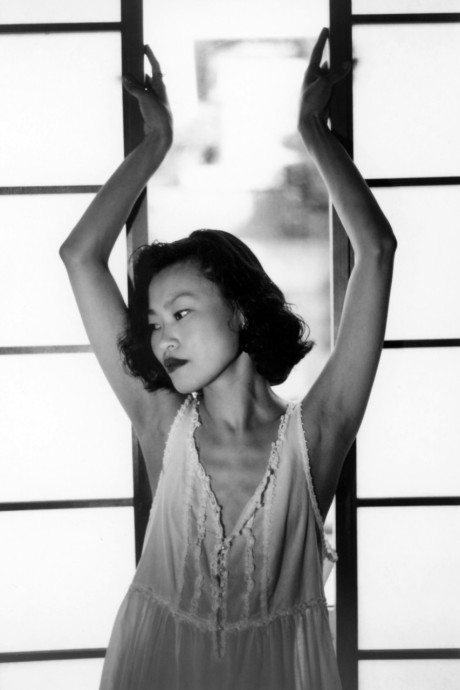 Asian babe shows her petite body & her tiny tits in a ebony & white scene