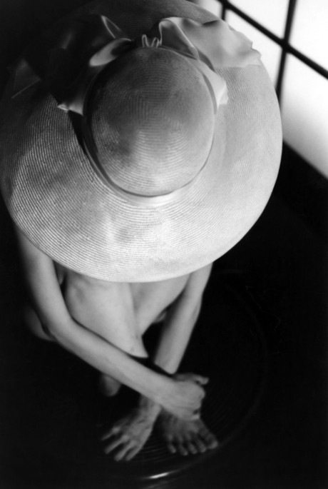 Asian babe shows her petite body & her tiny tits in a ebony & white scene