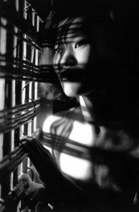 Asian babe shows her petite body & her tiny tits in a ebony & white scene