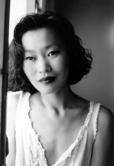 Asian babe shows her petite body & her tiny tits in a ebony & white scene