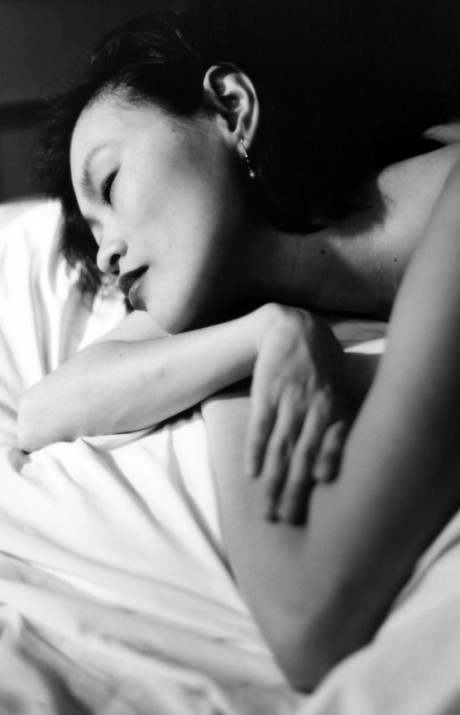 Asian babe shows her petite body & her tiny tits in a ebony & white scene