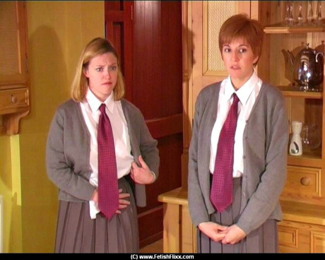 Misbehaving female students receive a brutal paddling from a female teacher