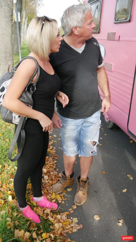 German pornstar with great juggs gets fucked by an older dude in a pink camper