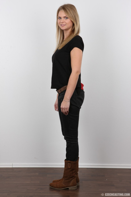 Appealing fresh teen amateur Dominika posing in various stages of undress