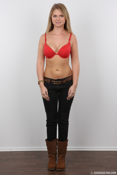 Appealing fresh teen amateur Dominika posing in various stages of undress