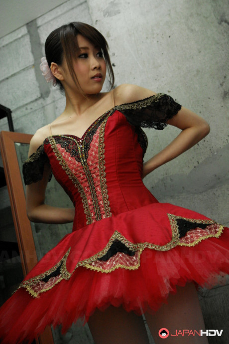Chinese ballerina Ririka Suzuki sucks dong with her juicy natural melons exposed