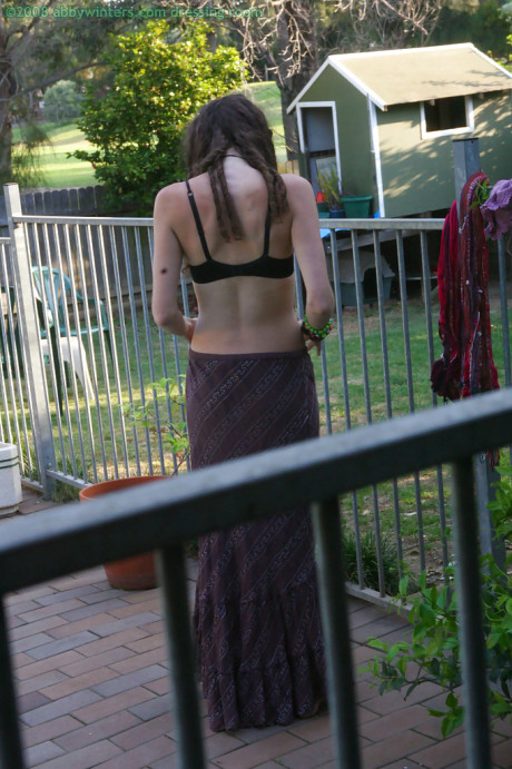 Horny brunette amateur Elyse getting dressed after masturbating