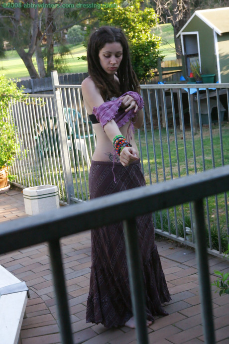 Horny brunette amateur Elyse getting dressed after masturbating