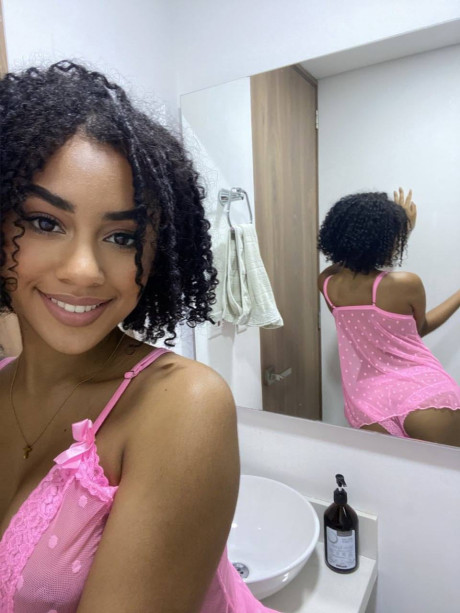 Hispanic lady lady Lisandra Official changes her swimwear during solo action