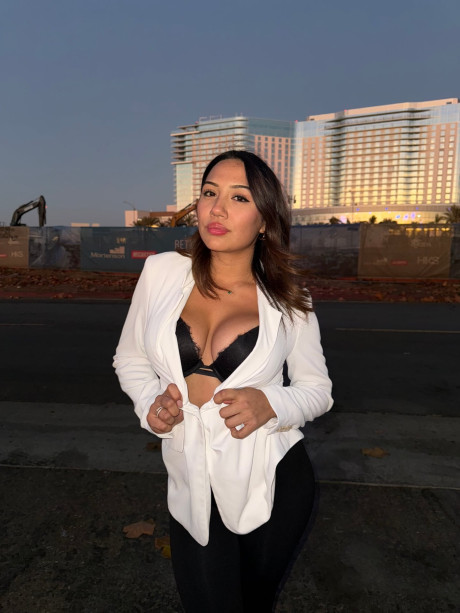 Solo slut gf broad exposes her ebony lace undergarment while taking off her blazer