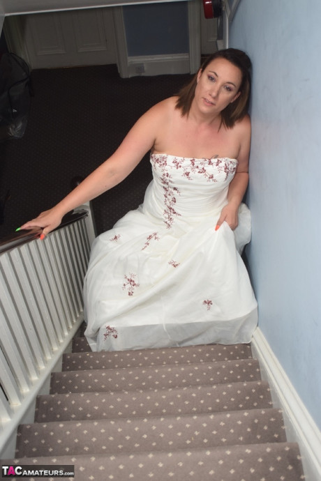Amateur lady Sara Banks as her tits and cunt freed from a gown by two men