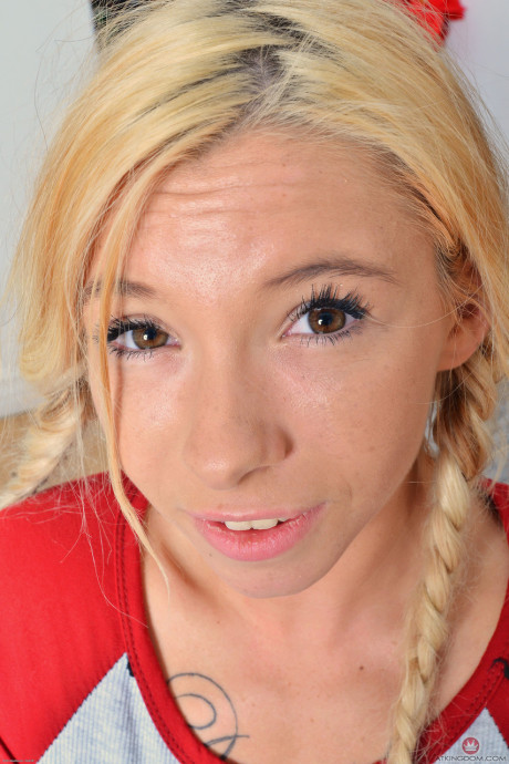 Thin yellow-haired teen Kenzie Reeves gives arousing views of her lovely puffy pussy