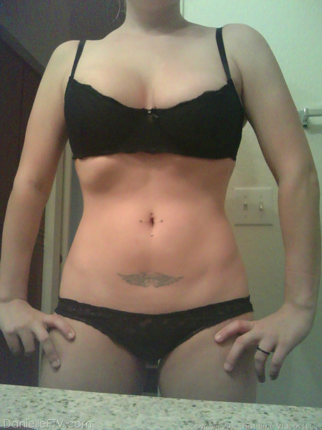 Huge titted blondy amateur Danielle takes sleazy selfies around the house