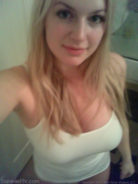 Huge titted blondy amateur Danielle takes sleazy selfies around the house