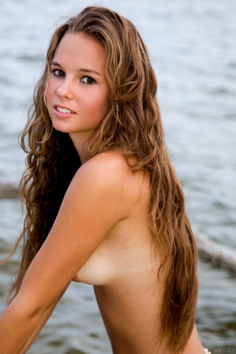 Glamorous young Aria A displays her hot body with tan lines on the beach