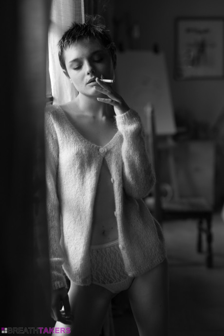Petite girl gf broad with short hair Caterina Foxy smokes while unclothed in her underwear