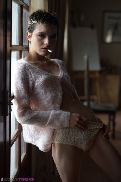 Petite girl gf broad with short hair Caterina Foxy smokes while unclothed in her underwear