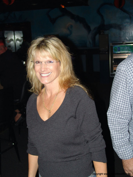 Cute cougar amateur Double Dee and hot strippers show their tits in a club