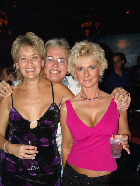 Cute cougar amateur Double Dee and hot strippers show their tits in a club