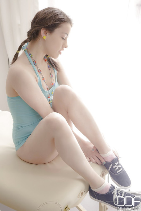 Cute little Euro teen whore girl broad in pigtails gingerly removing her panties