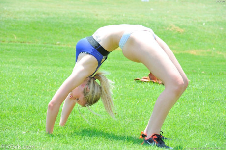 Dirty young chick girlfriend chick removes her clothes as she jogs and ends up undressed at the park