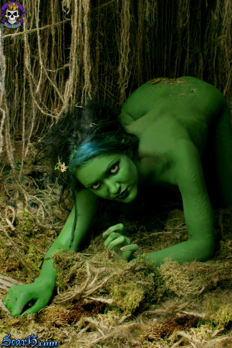 Solo bitch girl chick with green skin wanders around the woods with no clothes on