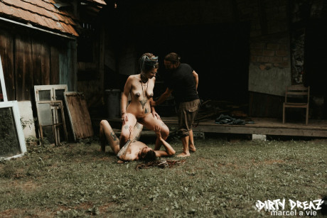 Heavily tattooed hoes piss on a undressed fiance bf lover outside the back steps of a house