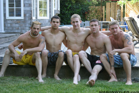 Yellow-haired Mason Wyler swallows multiple cocks in an intense gay blowbang