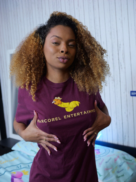 Black lady broad with curly hair partakes in interracial sex on a kitchenette table