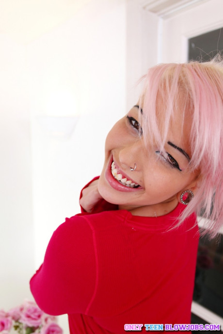 Pink haired teenie Christina squeezes her mesmerizing massive boobies and gives head