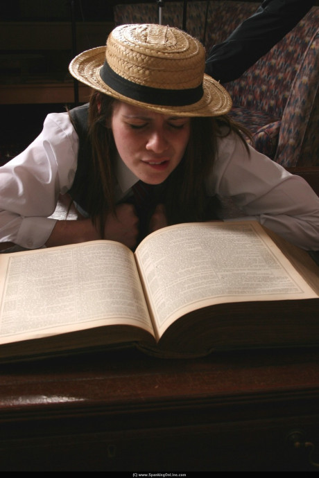 British student has her unprotected behind spanked and paddled by a Headmaster