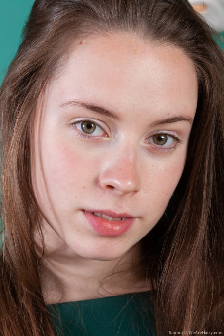 Brunette chick woman Sammi rips open her hose as she goes about showing her beaver