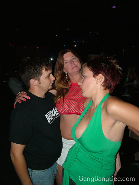 Mature woman Dee Delmar has lesbian relations at a swinger's club