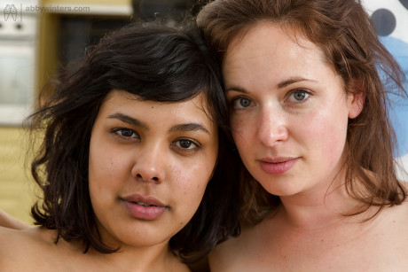 Chubby dykes Ashley D and Chloe V engage in interracial pussy eating