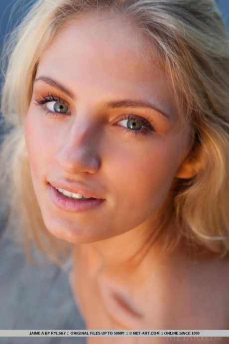 Fresh teenie yellow-haired female Jaime A stripping off clothes to model undressed outdoors