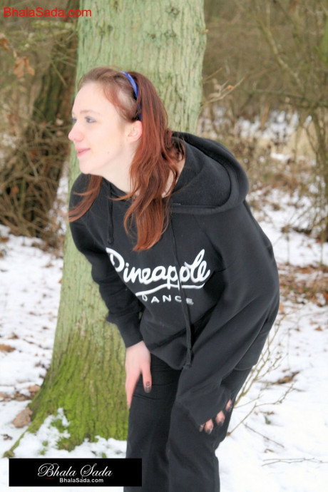Sexy lovely MILF posing butt undressed and stretching outdoors in cold weather