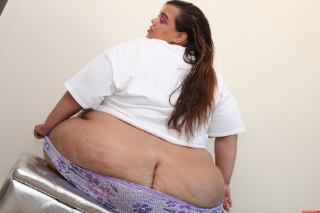 Amateur SSBBW Golden Bombshell slips lingerie over her behind crack