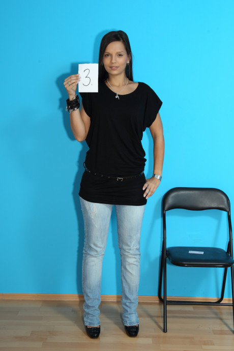 Amateur with a large booty Eve Angel undresses and poses at a casting