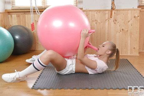 Euro babe Milane Blanc exposing underboobage in knee high socks