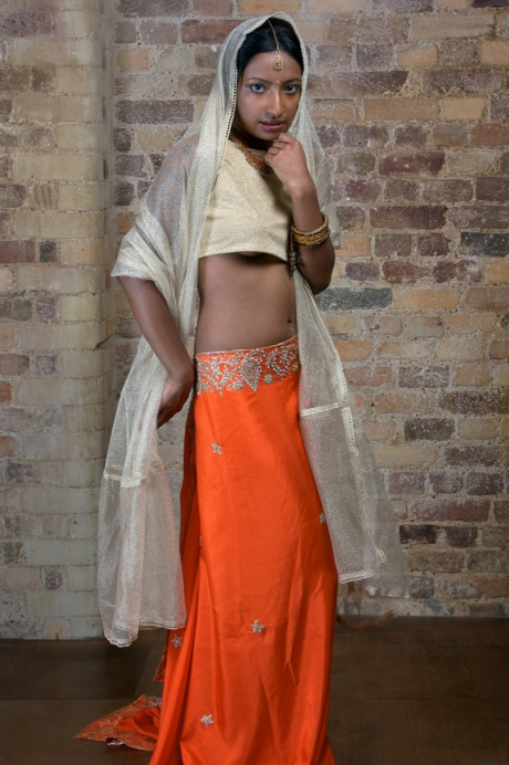 Indian model with tattoos exposes her firm breasts in traditional clothing
