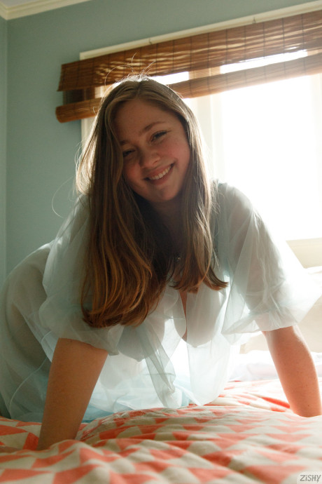 Gorgeous cute amateur babe with big titties Rose Fessenden posing in her sheer dress