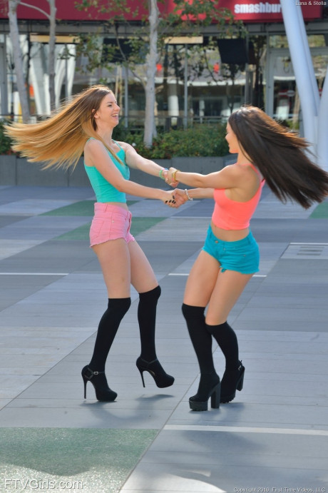 Babes in tiny shorts Lana & Stella show off their charming asses & boobs in public