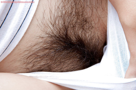 Nerdy amateur in long socks and white panties flashes furry pussy