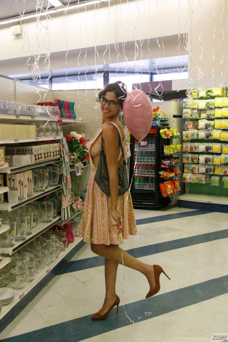 Adorable babe in glasses Yeraz Gebeshian shows her hot legs & her nice boobs