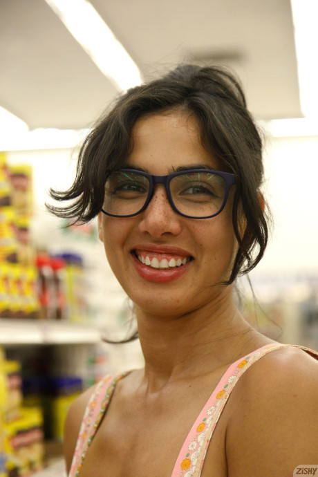 Adorable babe in glasses Yeraz Gebeshian shows her hot legs & her nice boobs