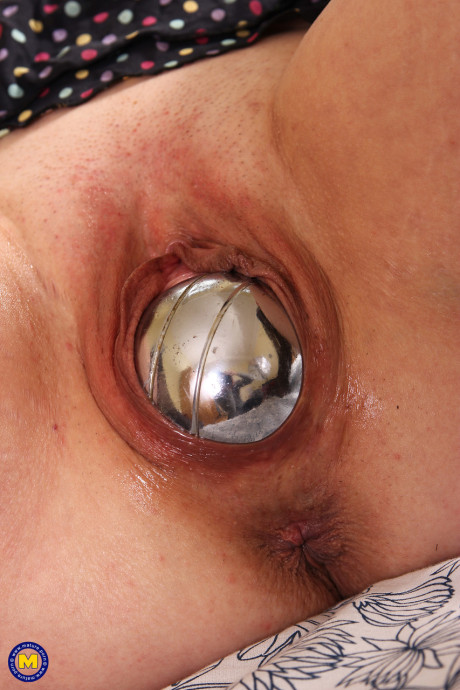 Old lady Paulana inserts a giant dildo and a silver ball into her chunky twat