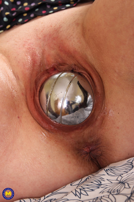 Old lady Paulana inserts a giant dildo and a silver ball into her chunky twat